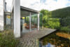 Moderne Einfamilienhausvilla mit Einliegerwohnung auf traumhaftem Süd-West Grundstück - Glashaus mit Teich