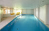 Familienfreundliche Villa mit seltenem Parkgrundstück & Schwimmbad in Alt-Meererbusch - Pool im Haus