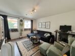 Moderne 3-Zimmer-Wohnung mit Balkon und Carport in gefragter Lage von Düsseldorf - Wohnzimmer