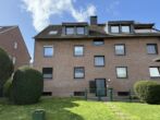 Kapitalanlage oder Eigennutzung - 3-Zimmer-Dachgeschosswohnung und Einzelgarage in Neuss-Rosellen - Rückansicht
