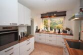 Großzügige 4-Zimmer-Wohnung mit großer Dachterrasse im Herzen von Meerbusch-Büderich - helle Küche
