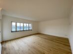 Schöne 3-Zimmer-Wohnung mit EBK und Balkon in ruhiger Lage von Meerbusch-Strümp - Wohn-/Esszimmer Ansicht 2