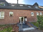 Charmante 2-Zimmer-Wohnung mit Einbauküche in beliebter Lage von Meerbusch-Büderich - Hausansicht 1