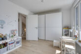 Moderne Doppelhaushälfte mit Süd-West-Grundstück im Wohnquartier „Wimmersberger Südblick" - Ansicht 2