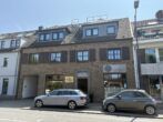 Helle Etagenwohnung mit Sonnenloggia und Ausblick ins Grüne auf der Dorfstraße in MB-Büderich - Außenansicht