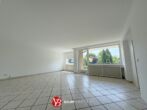 Helle Etagenwohnung mit Sonnenloggia und Ausblick ins Grüne auf der Dorfstraße in MB-Büderich - Titelbild