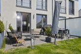 Moderne Doppelhaushälfte mit Süd-West-Grundstück im Wohnquartier „Wimmersberger Südblick" - Terrasse