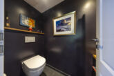 Zeitlose Villa in Rheinnähe mit außergewöhnlicher Architektur und Weitblick - Gäste-WC