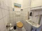 Traumhafte 3-Zimmer-Wohnung mit EBK und Sonnenbalkon in beliebter Lage von Meerbusch-Büderich - Gäste-WC